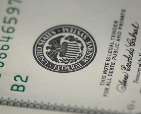 macro photo of federal reserve system symbol on hundred dollar