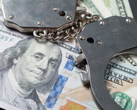 Handcuff and dollars