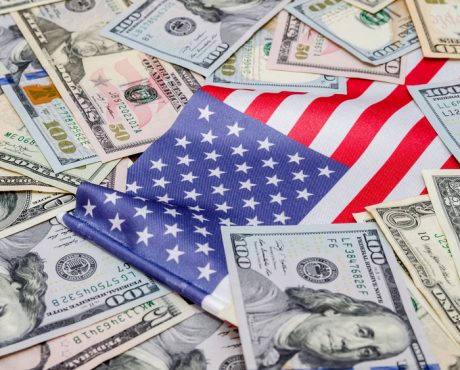 American dollars and flag